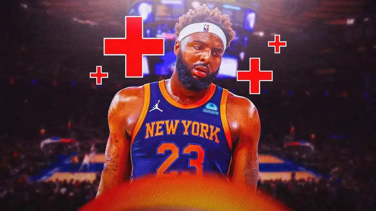 Knicks' Mitchell Robinson with red medical symbols