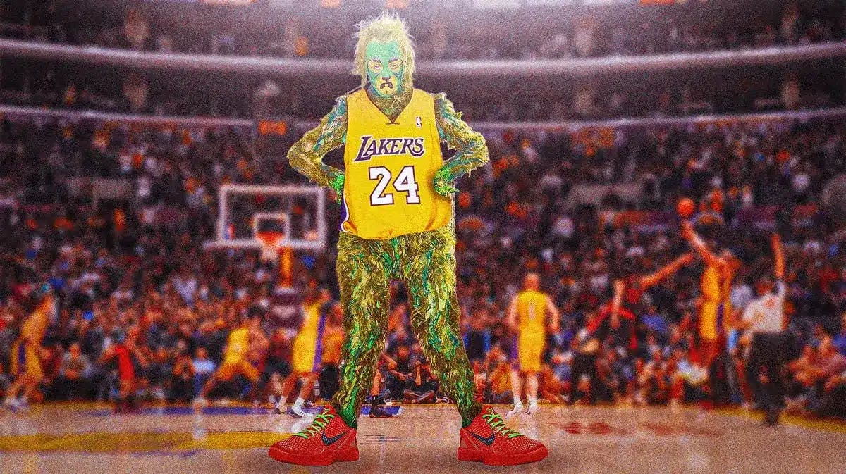 The Grinch himself wearing a Kobe Bryant jersey and a pair of the Reverse Grinch Kobe VI's