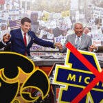 College Gameday grew with Iowa logo in the back and Michigan logo with an “X” on it