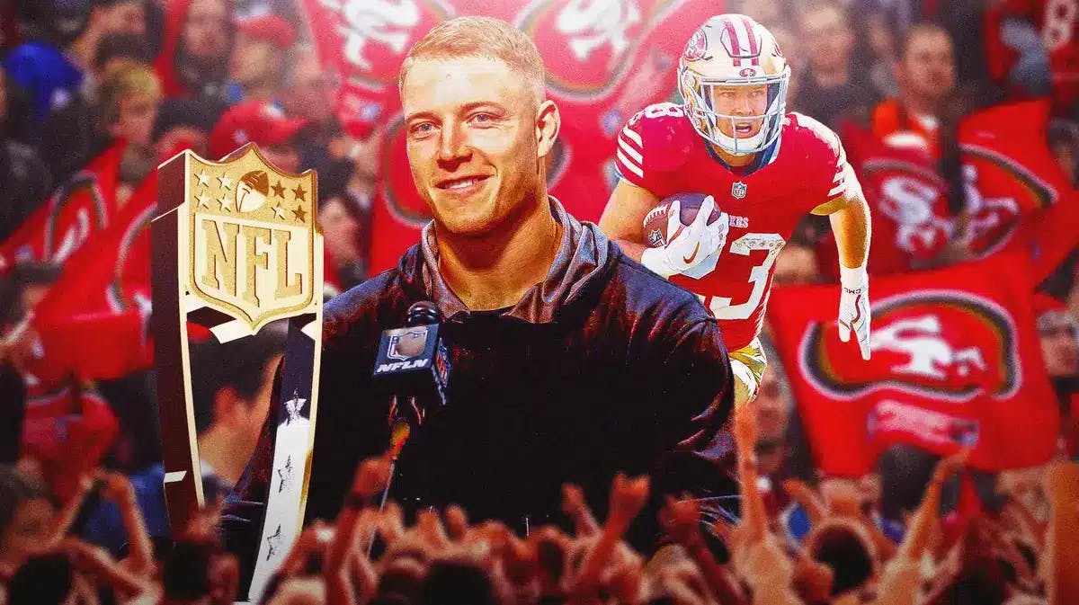 Photo: Christian McCaffrey in Niners uniform with OPOY trophy and Niners fans in the back