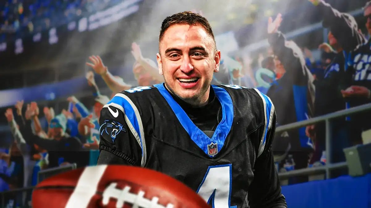 Carolina Panthers' Eddy Pineiro looking happy and Panthers fans celebrating in background