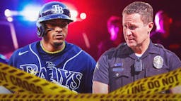 Rays shortstop Wander Franco with a police officer