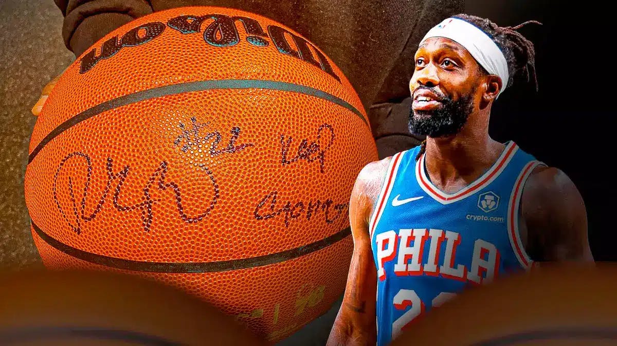 Sixers' Patrick Beverley next to a basketball that he signed
