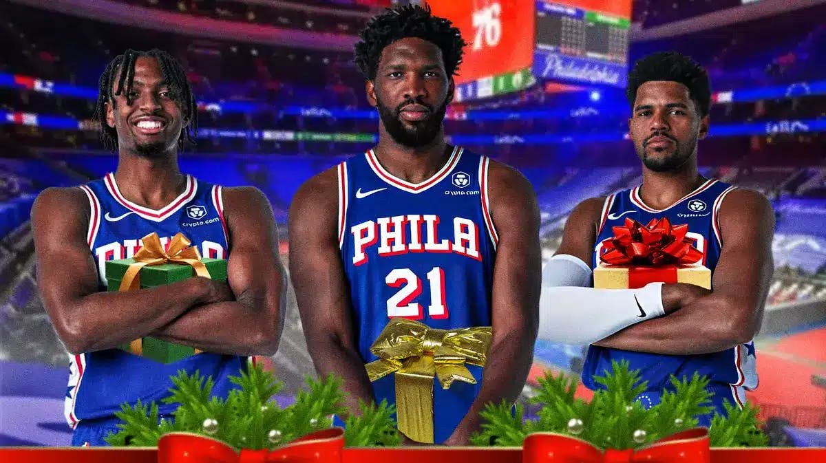 Sixers' Tyrese Maxey, Joel Embiid and Tobias Harris holding Christmas gifts