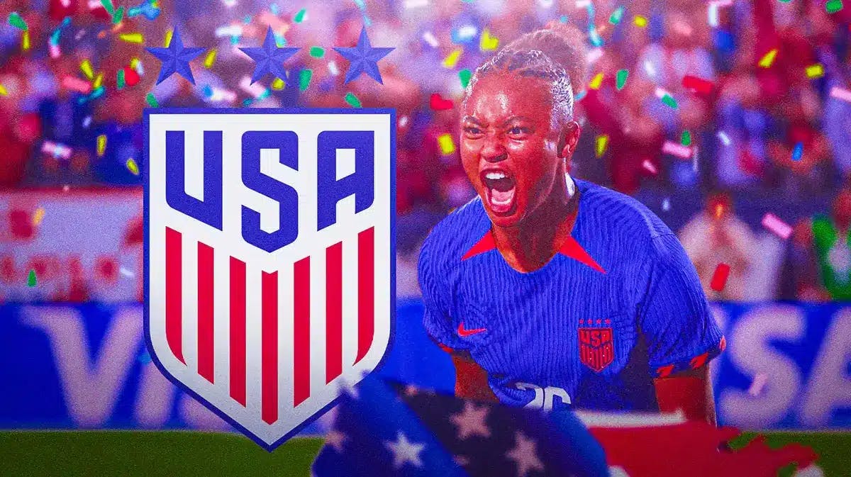 Jaedyn Shaw celebrating in front of the USWNT logo