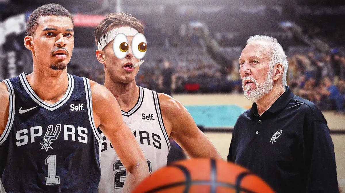 Spurs' Victor Wembanyama, Zach Collins looking at Gregg Popovich