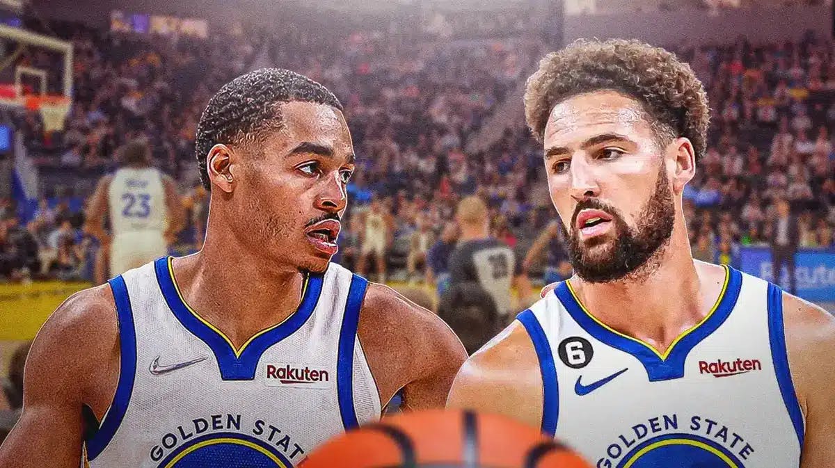 Photo: Klay Thompson and Jordan Poole in Warriors uniform with Chase Center in the back