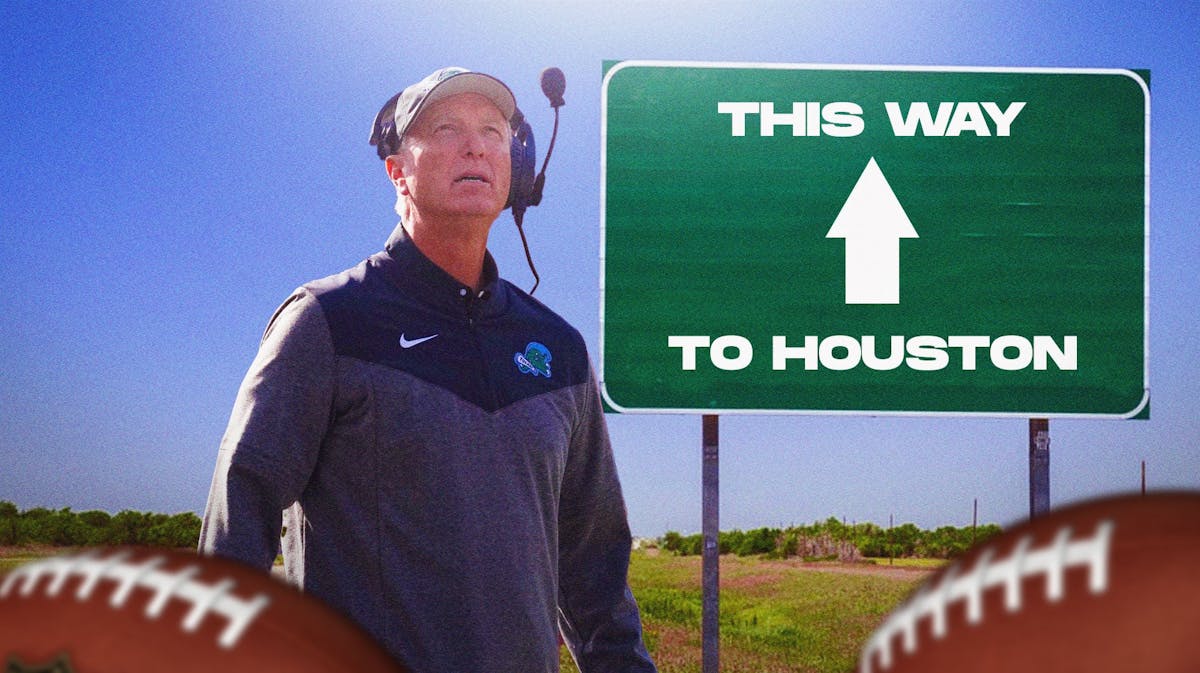Tulane coach Willie Fritz looking at a sign saying "This Way to Houston."