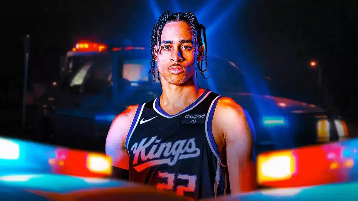 Former Kings G League player Chance Comanche with cop cars around him