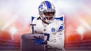 Photo: Tedd Bridgewater in a Lions uniform with his luggage and NFL logo in the background