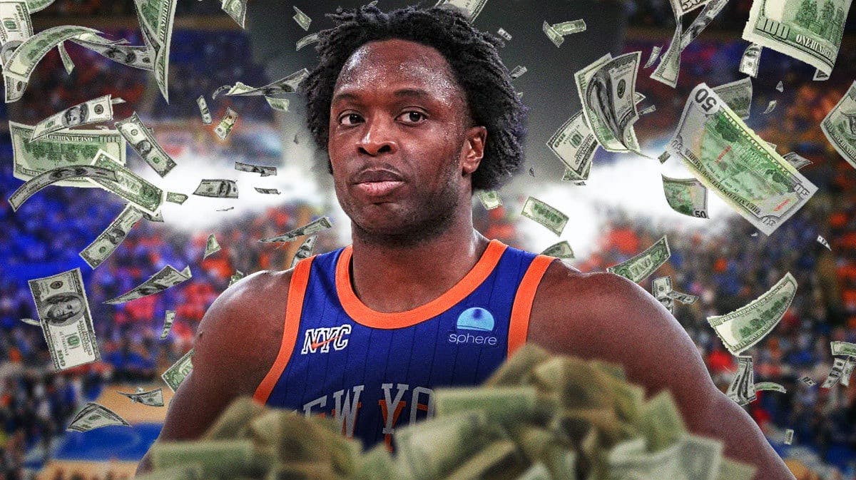O.G. Anunoby surrounded by piles of cash.