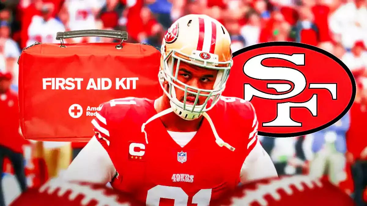Photo: Arik Armstead in Niners gear with med kits and Niners logo behind him