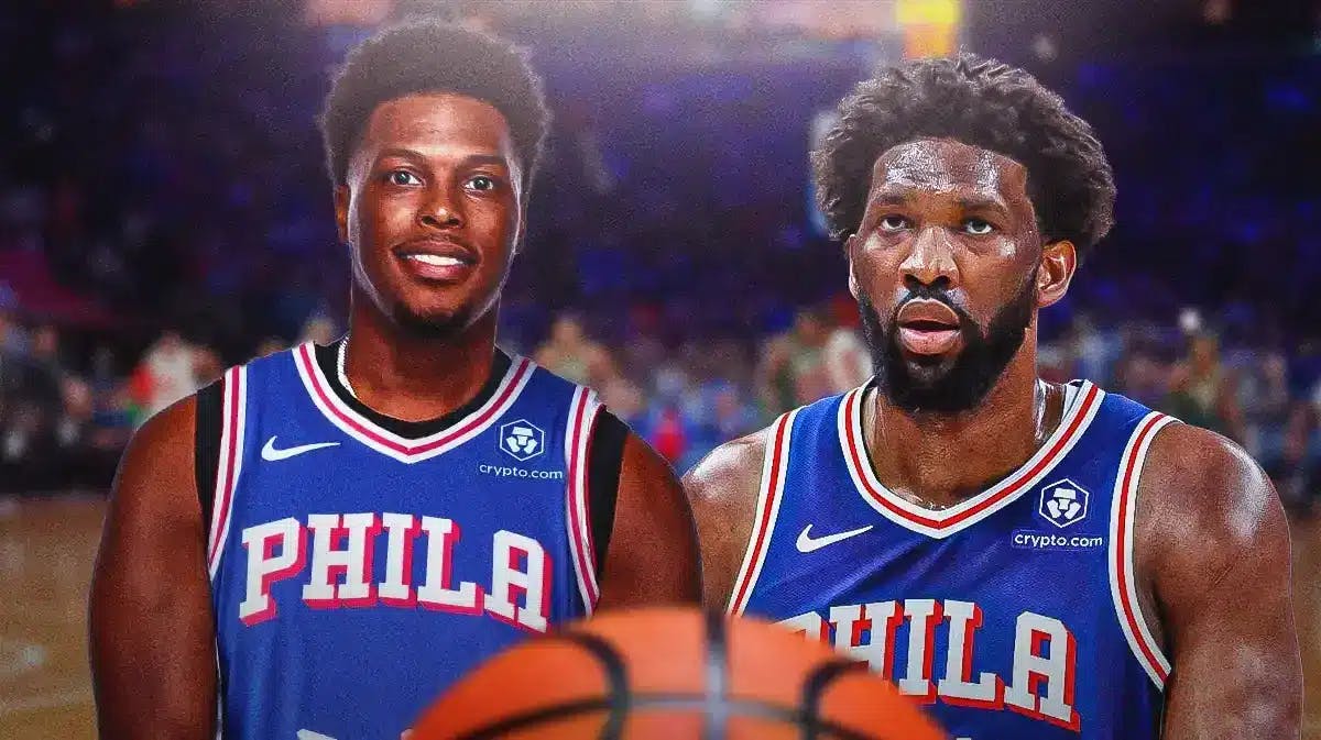 76ers' Joel Embiid next to Kyle Lowry in a numberless 76ers jersey