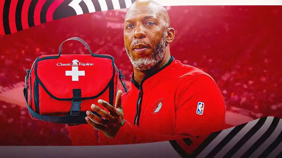 Blazers coach Chauncey Billups holding a first aid kit