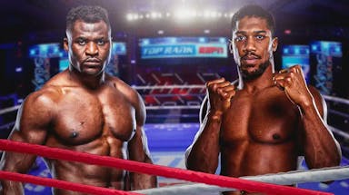 Francis Ngannou facing of Anthony Joshua in a boxing ring