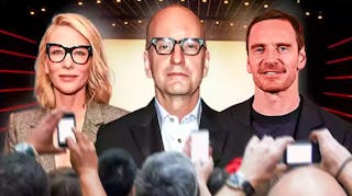 Cate Blanchett, Steven Soderbergh and Michael Fassbender in front of a crowd.