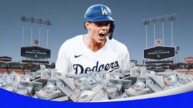 Dodgers catcher Will Smith surrounded by cash