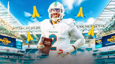 Dolphins' Bradley Chubb smiling while holding an NIV Bible, prayer hands emoji all over