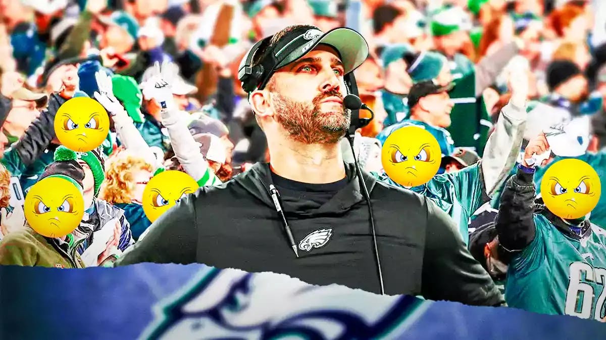 Philadelphia Eagles head coach Nick Sirianni with angry Eagles fans behind him