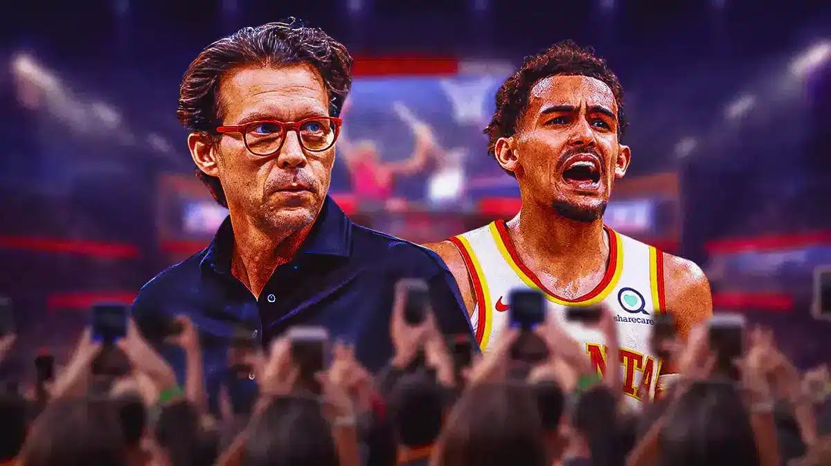 Atlanta Hawks coach Quin Snyder on the left beside Trae Young who is looking worried