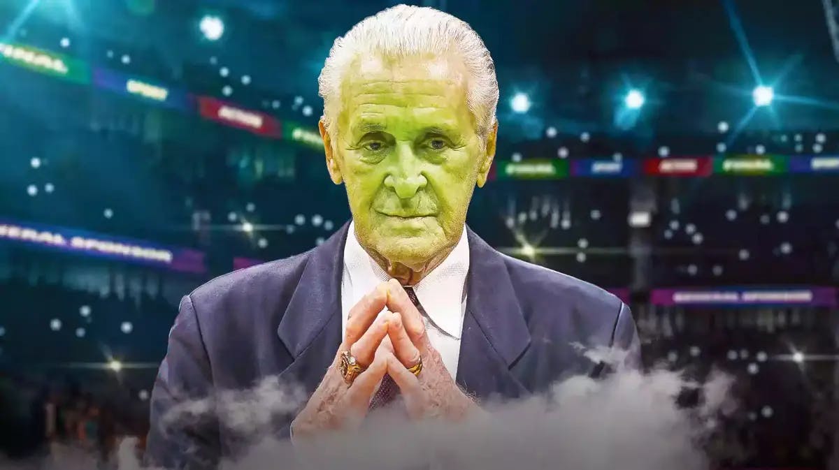 Heat president Pat Riley looking green like he's going to throw up