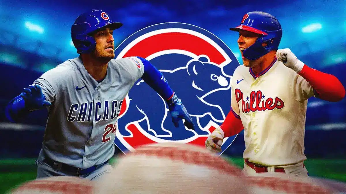 Cody Bellinger and Rhys Hoskins next to the Cubs logo