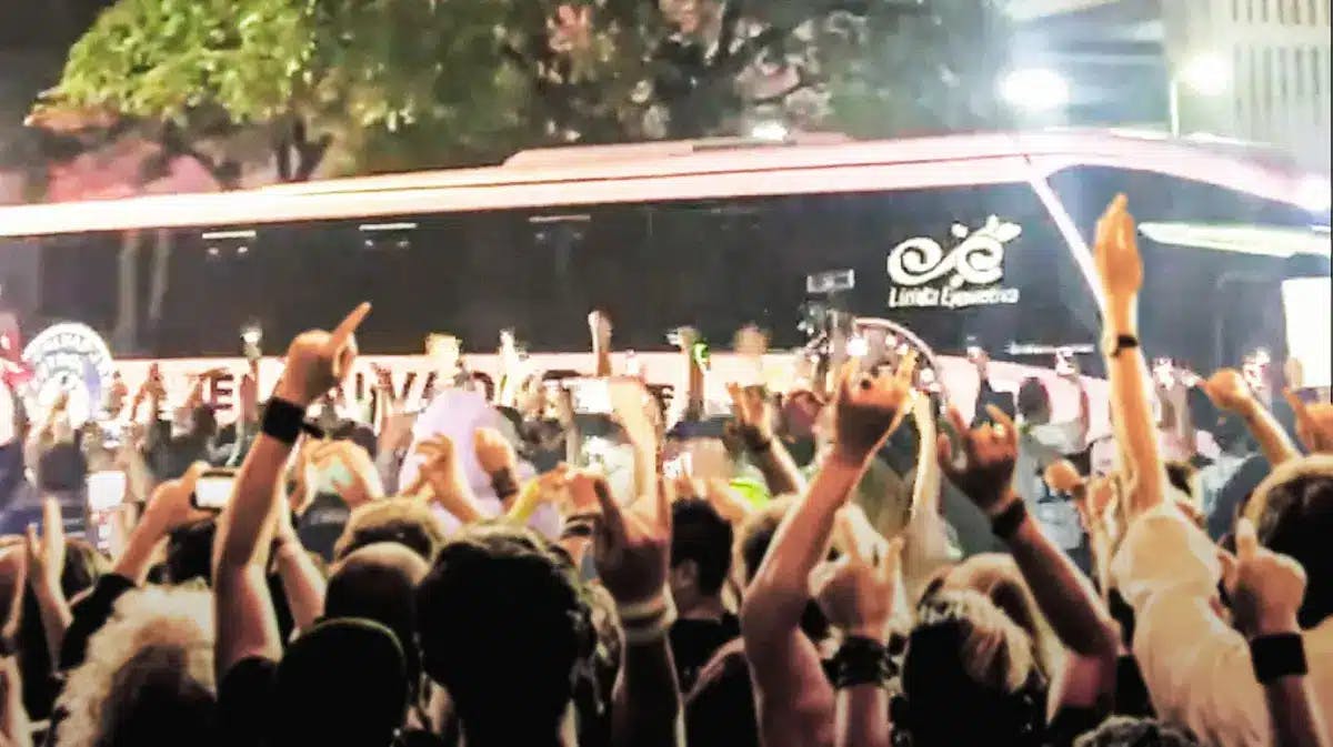 Lionel Messi and Inter Miami CF bus surrounded by fans