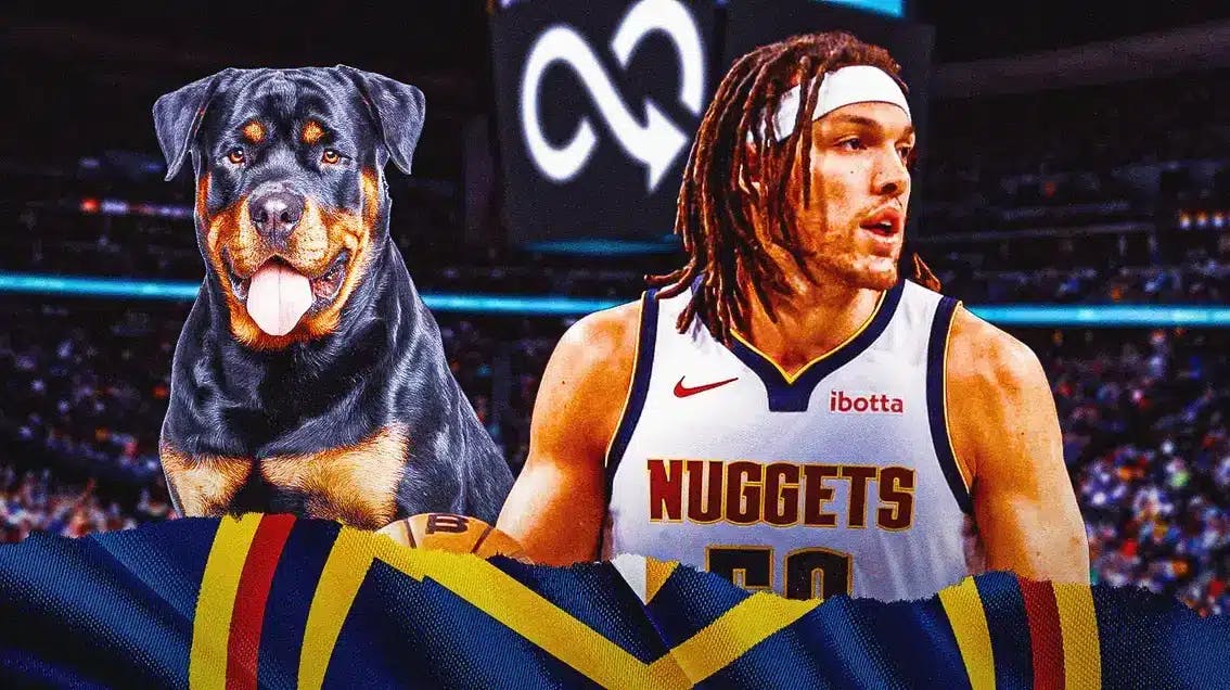 Nuggets' Aaron Gordon next to a Rottweiler