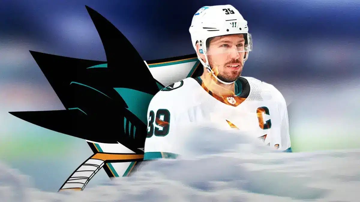 Logan Couture in middle of image with fire around him, SJ Sharks logo, hockey rink in background