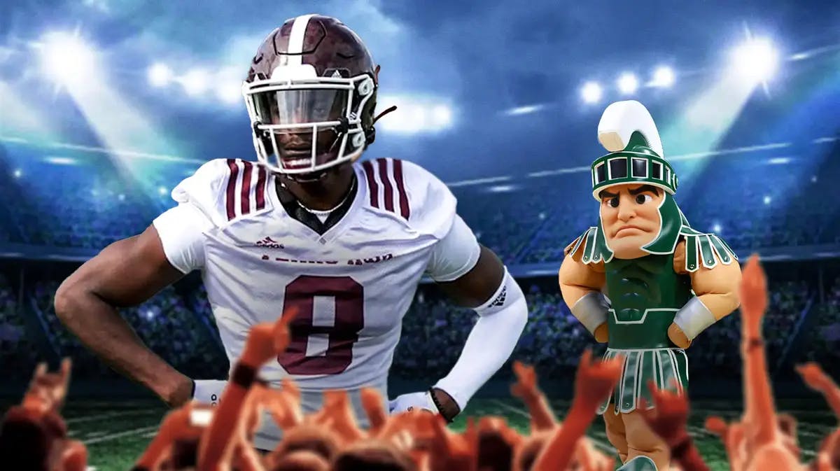 Tony Grimes (Texas A&M Cornerback) with MICHIGAN STATE SPARTANS mascot in the background