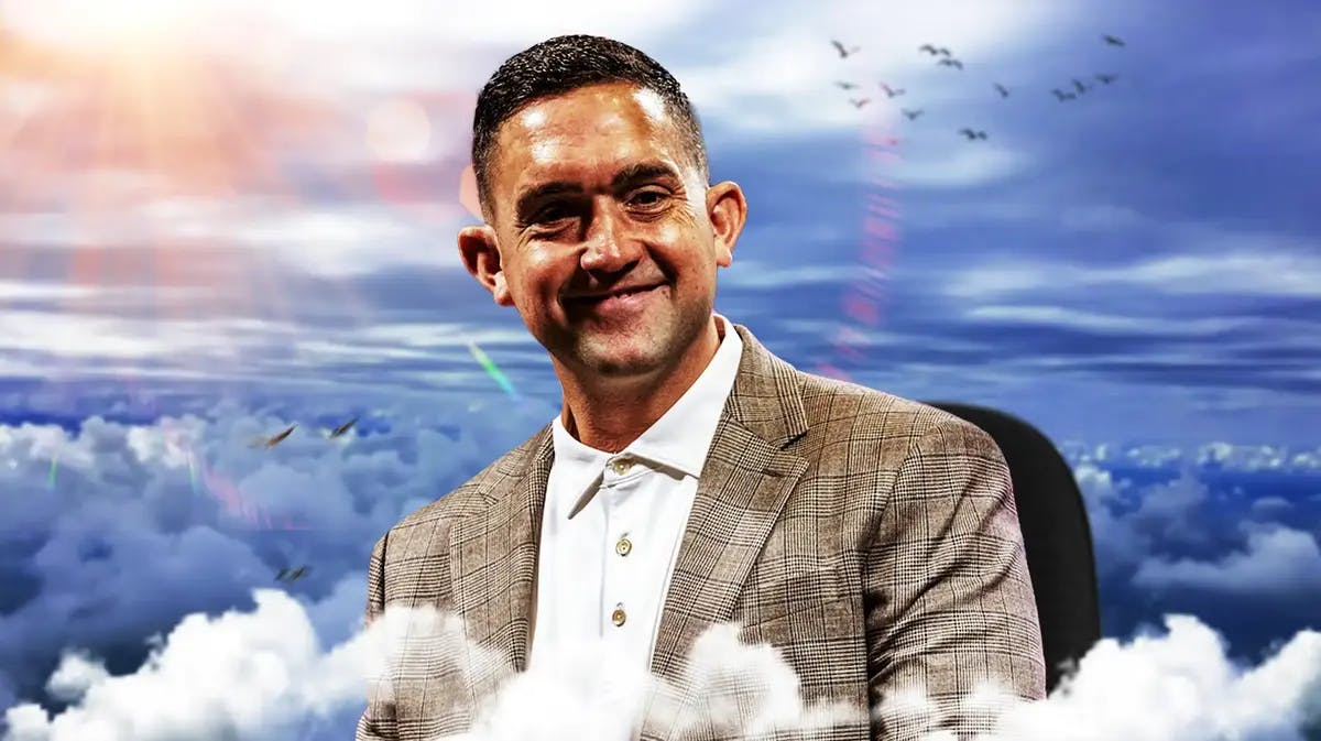Mississippi State women’s basketball coach Sam Purcell, as if on sitting on clouds