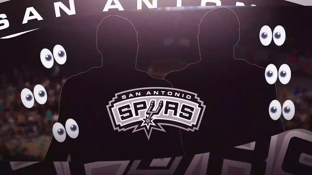 Spurs logo with 2 silhouette basketball players