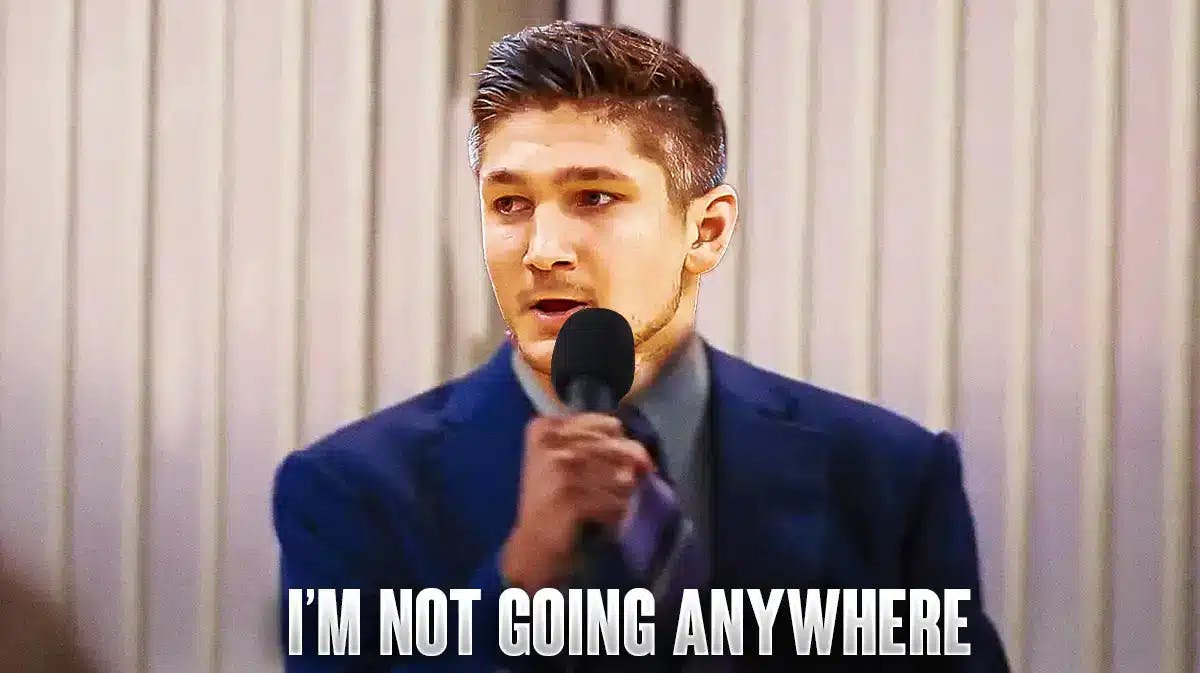 Suns' Grayson Allen's head on Leonard DiCaprio from Wolf of Wall Strett saying "I'm not going anywhere"