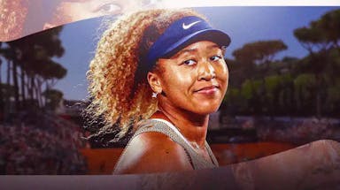 - Women’s tennis player Naomi Osaka in tennis gear on a tennis court, looking happy