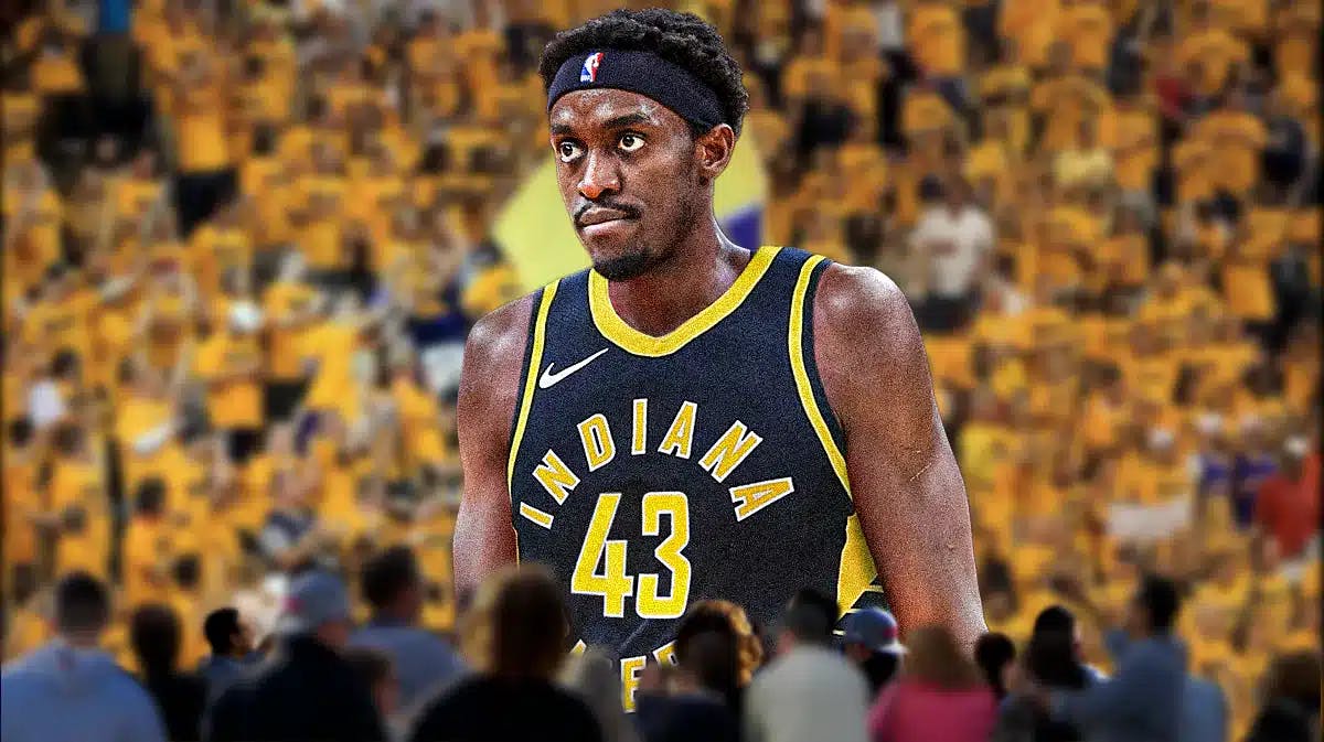 Pascal Siakam in a Pacers jersey with Pacers fans cheering in the background