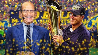 Photo: Jim Harbaugh with the National Championship trophy and Paul Finebaum right next to him, confetti falling