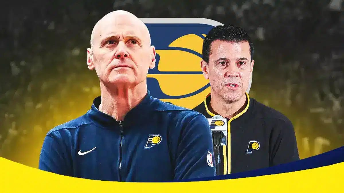 Rick Carlisle and Chad Buchanan in front of a Pacers logo
