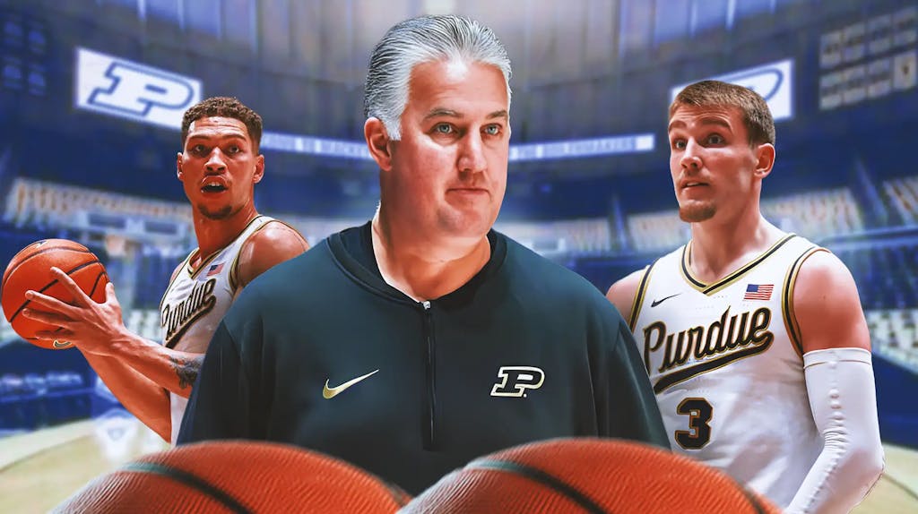 Purdue basketball coach Matt Painter, with Purdue players, in the background.