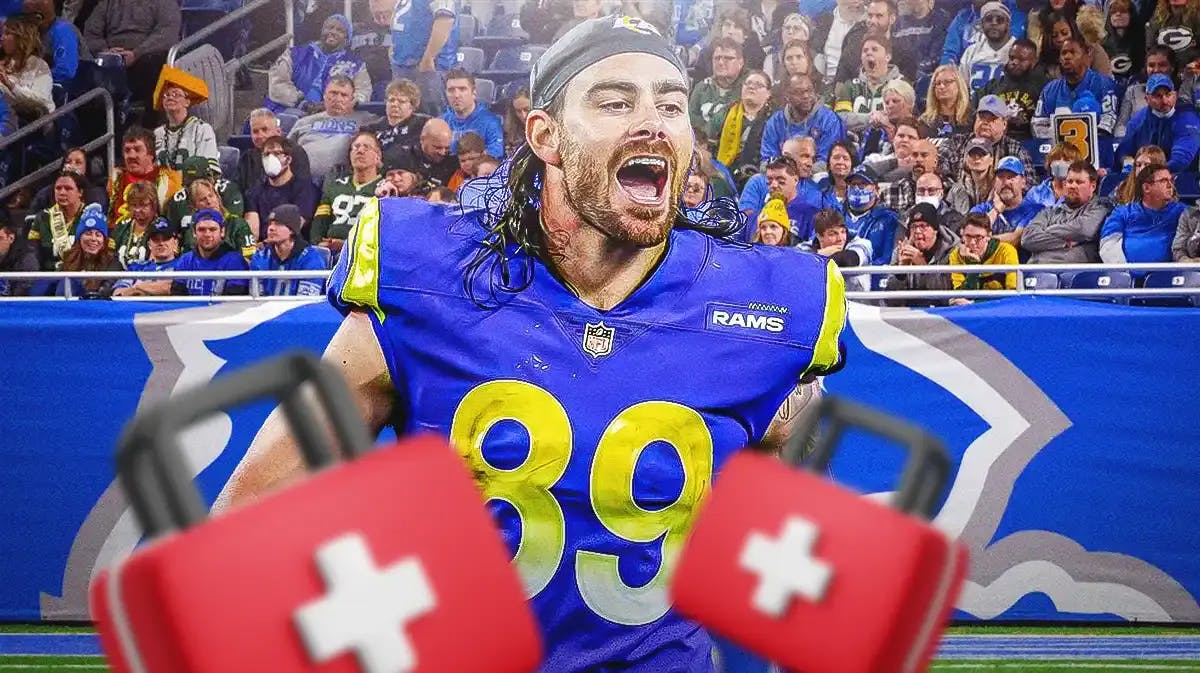 Photo: Tyler Higbee in Rams gear with medkits around him and Ford Field behind him