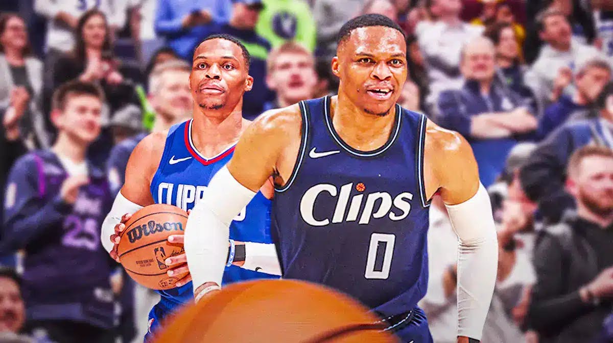 Clippers guard Russell Westbrook in foreground, Timberwolves fans in background.