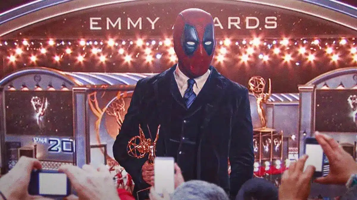 Ryan Reynolds as Deadpool holding an Emmy.
