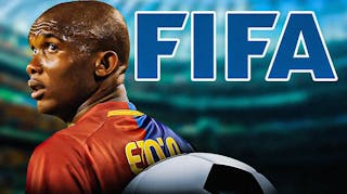 Samuel Eto'o in front of the FIFA logo