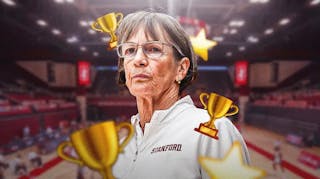 Stanford women’s basketball coach Tara VanDerveer with trophy emojis and stars around her