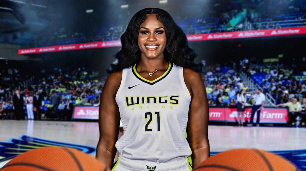 Kalani Brown with the Dallas Wings arena in the background, WNBA Free Agency