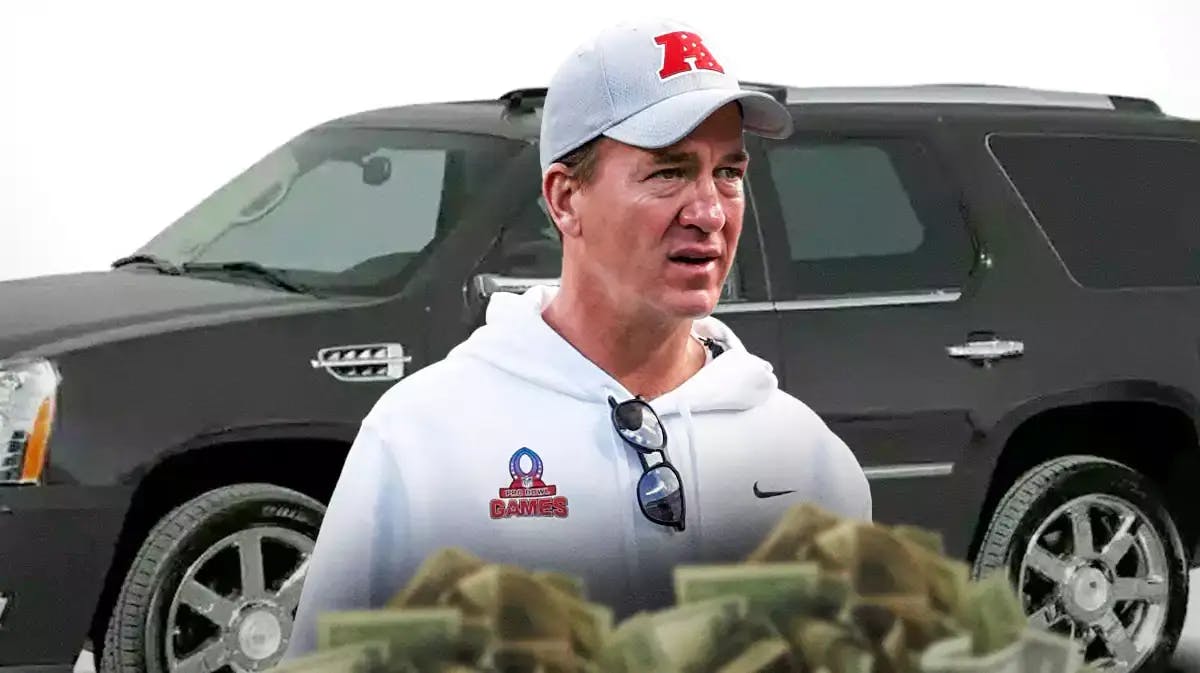Peyton Manning in front of an SUV from his car collection.