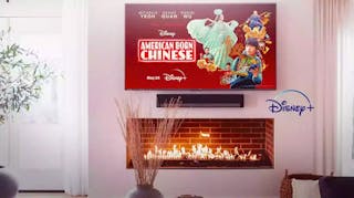 American Born Chinese poster on TV with living room background and Disney+ logo.
