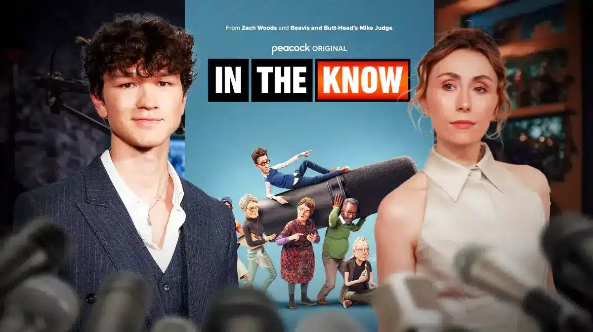 Charlie Bushnell and Caitlin Reilly with In the Know poster between them.