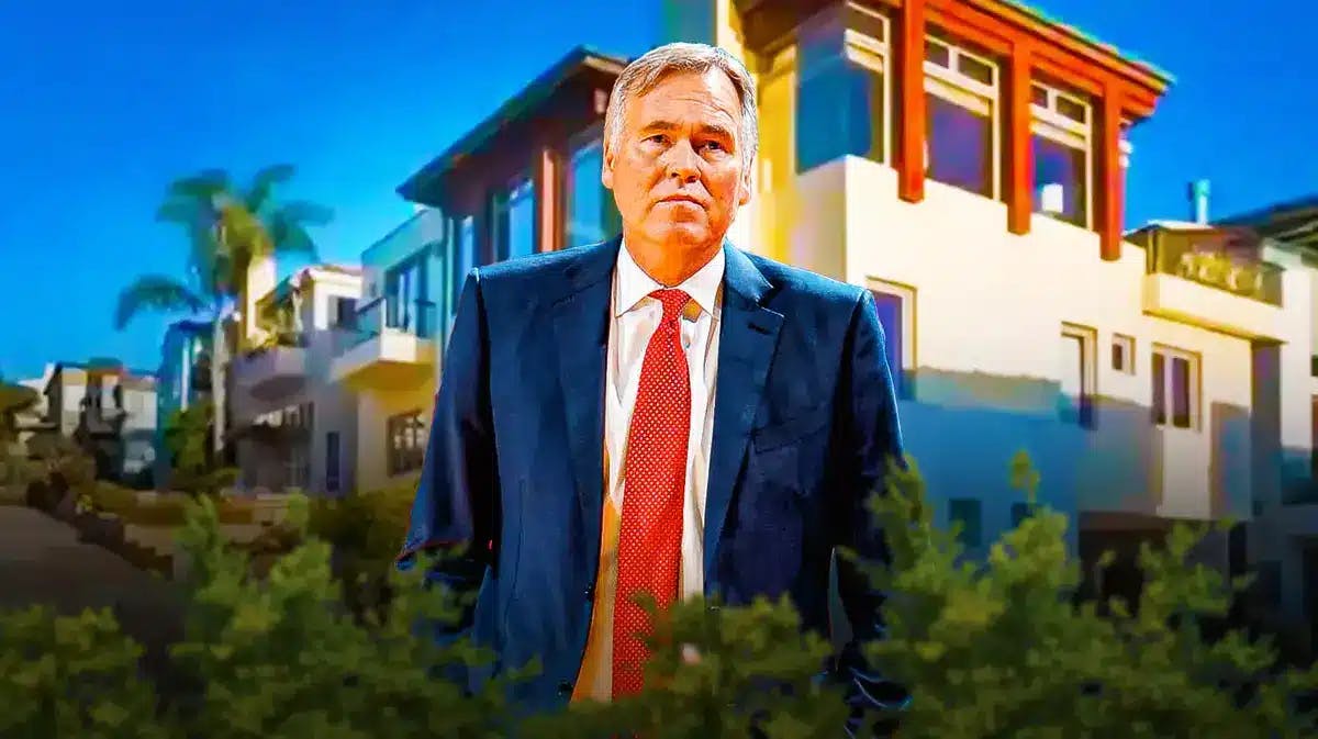 Mike D'Antoni in front of his former home.