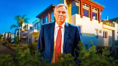 Mike D'Antoni in front of his former home.