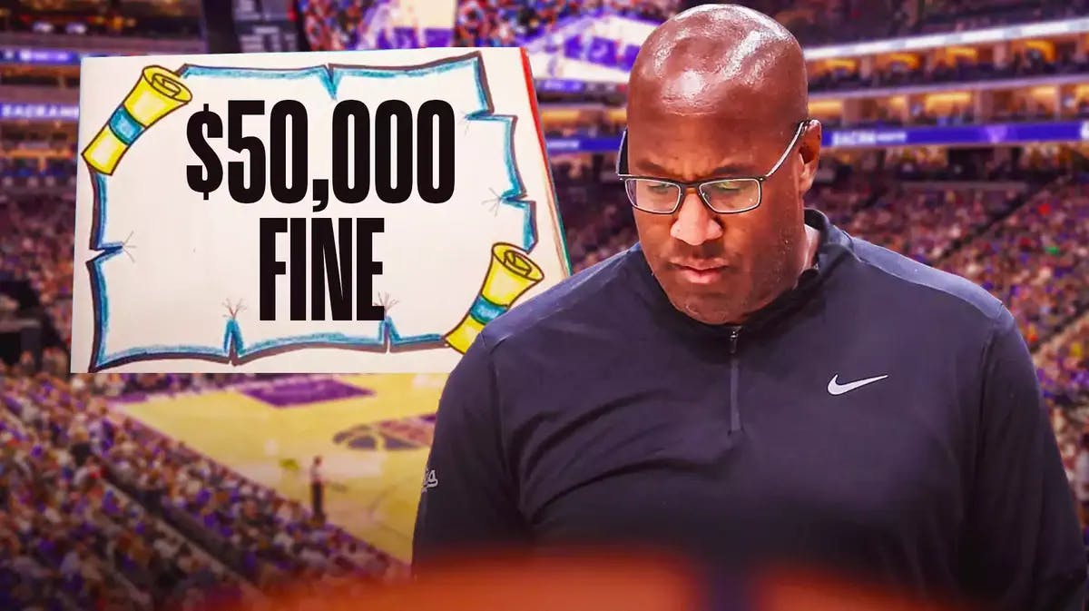 Sacramento Kings HC Mike Brown looking sad with slogan at the back that says $50,000 fine
